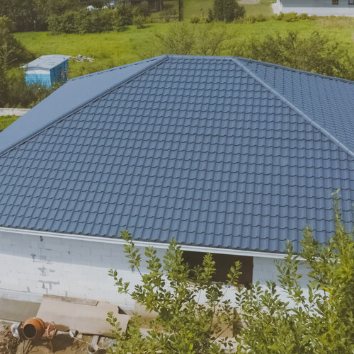 building with new metal roof